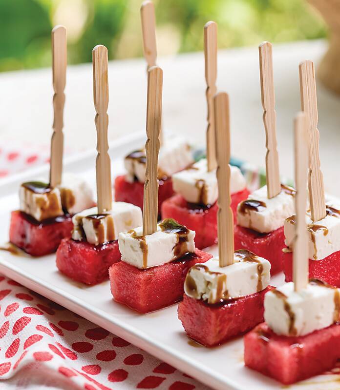 Nine Watermelon and Feta Skewers drizzled with balsamic vinegar