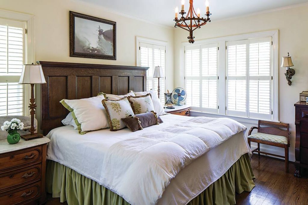 Southern hospitality in a bedroom with dark wood accents