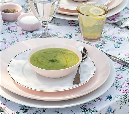 Chille Zucchini and Basil Soup in a pale-pink bowl