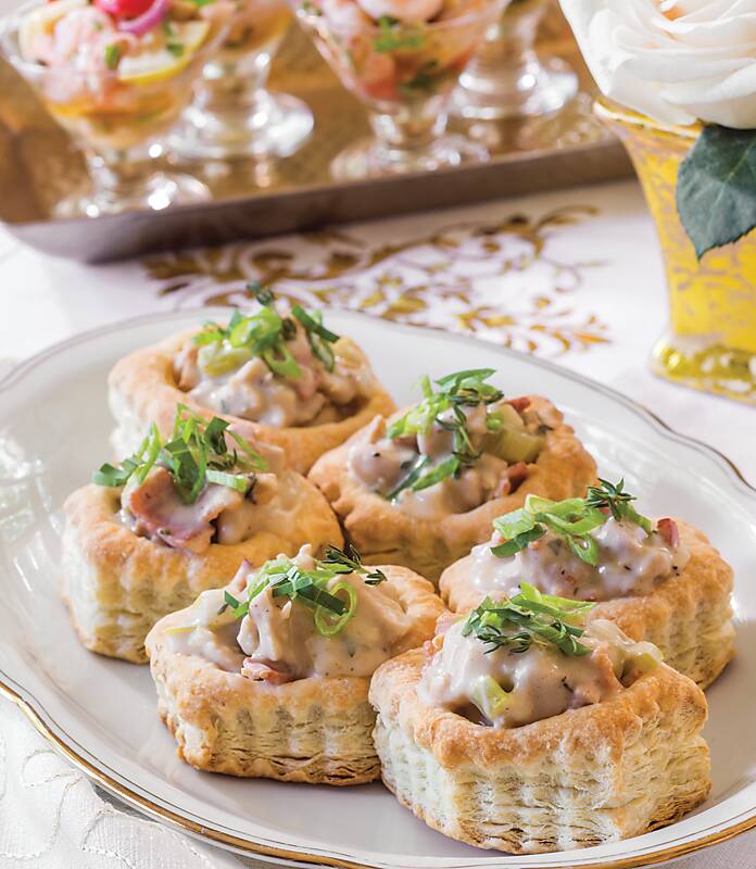 Creamed Tarragon Chicken and Bacon Vol-au-Vents served on a white platter