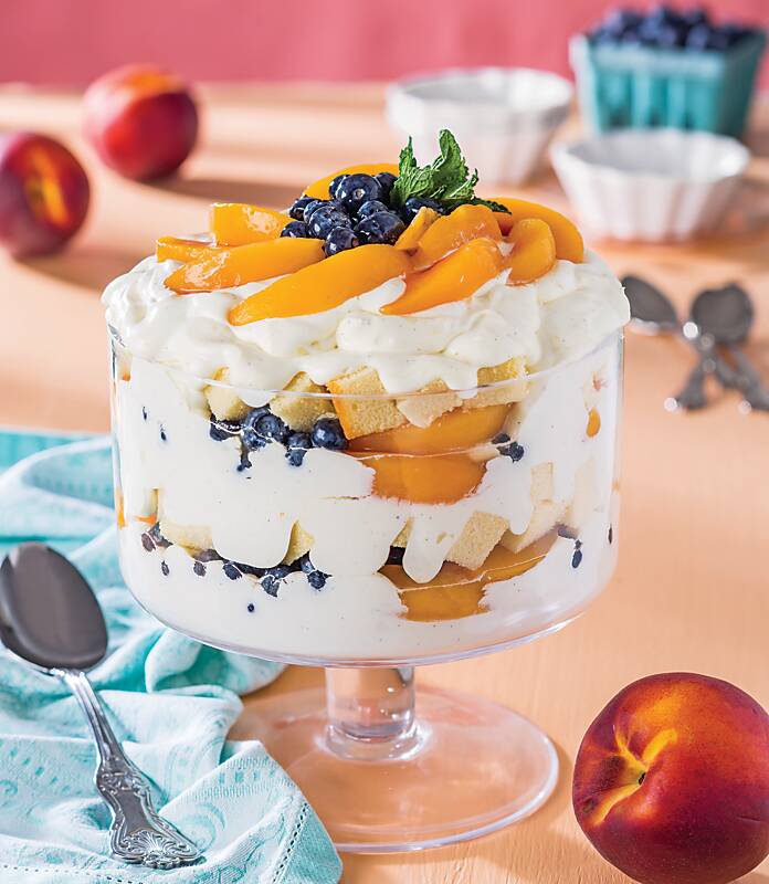 Peach-Blueberry Trifle in a clear pedestal trifle bowl