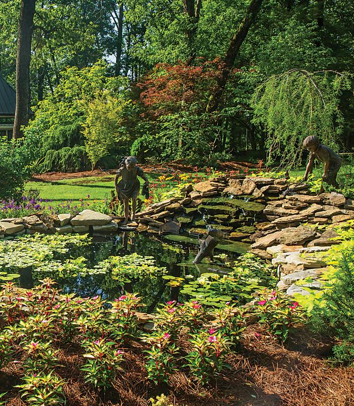 Garden pond with statuary at Baker Arboretum