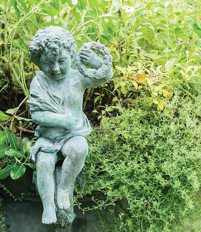 Cherub-style garden statue