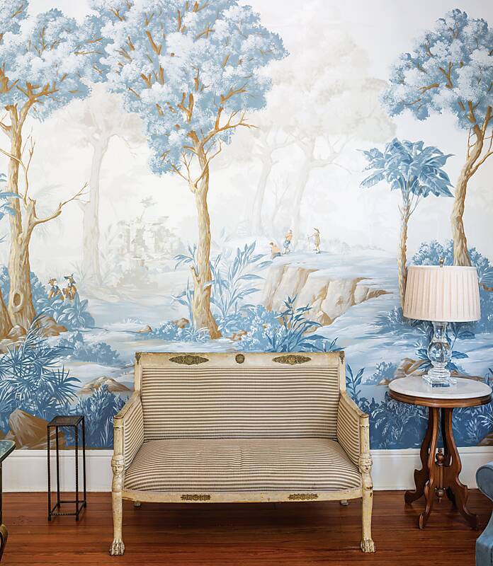 Hamilton-Turner Inn parlor featuring a blue landscape wallpaper