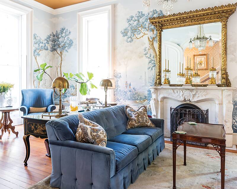 Hamilton-Turner Inn parlor with blue velvet sofa and a gilded mirror