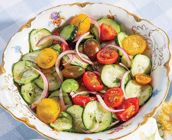 Cucumber, Tomato, and Onion Salad in a white floral china bowl